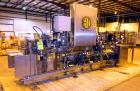 Used Hartness 825-AT automatic stainless steel drop case packer case packer capable of speeds up to 35 cases per minute (depending on product and application). Case size range: (Length) 6