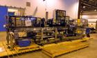 Used- Hartness 825-AT automatic stainless steel drop case packer case packer capable of speeds up to 35 cases per minute (de...