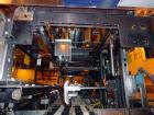 Used Hartness 825-AT automatic stainless steel drop case packer case packer capable of speeds up to 35 cases per minute (depending on product and application). Case size range: (Length) 6
