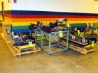 Used Hartness International 825AT Case Packer Change Parts. Consisting Of: 3 skids, 3 carts. 580cc (12pk), 1875cc (6pk.), 850cc (6pk.), 1250cc (6pk.), 1875cc (8pk.), 850cc (12pk.), 5.5 oz. (12pk.), 1...