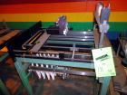 Used Hartness International 825AT Case Packer Change Parts. Consisting Of: 3 skids, 3 carts. 580cc (12pk), 1875cc (6pk.), 850cc (6pk.), 1250cc (6pk.), 1875cc (8pk.), 850cc (12pk.), 5.5 oz. (12pk.), 1...
