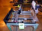 Used Hartness International 825AT Case Packer Change Parts. Consisting Of: 3 skids, 3 carts. 580cc (12pk), 1875cc (6pk.), 850cc (6pk.), 1250cc (6pk.), 1875cc (8pk.), 850cc (12pk.), 5.5 oz. (12pk.), 1...