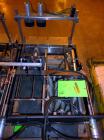 Used Hartness International 825AT Case Packer Change Parts. Consisting Of: 3 skids, 3 carts. 580cc (12pk), 1875cc (6pk.), 850cc (6pk.), 1250cc (6pk.), 1875cc (8pk.), 850cc (12pk.), 5.5 oz. (12pk.), 1...