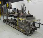 Used Hartness Model 825 Automatic Drop Case Packer