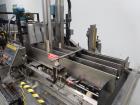 Used Hartness Model 825 Automatic Drop Case Packer