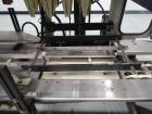 Used Hartness Model 825 Automatic Drop Case Packer
