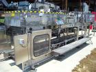 Used Hartness Model 825 Fully Auto Case Packer with all stainless steel frame.Unit has been recently upgraded from factory with Parker drives for auto-laner.Panel is complete with AB 503 PLC controll...