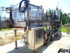 Used Hartness Model 825 Fully Auto Case Packer with all stainless steel frame.Unit has been recently upgraded from factory with Parker drives for auto-laner.Panel is complete with AB 503 PLC controll...