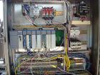 Used Hartness Model 825 Fully Auto Case Packer with all stainless steel frame.Unit has been recently upgraded from factory with Parker drives for auto-laner.Panel is complete with AB 503 PLC controll...
