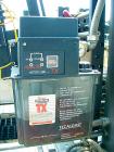 Used Hartness Model 825 Fully Auto Case Packer with all stainless steel frame.Unit has been recently upgraded from factory with Parker drives for auto-laner.Panel is complete with AB 503 PLC controll...