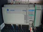 Used Hartness Model 825 Fully Auto Case Packer with all stainless steel frame.Unit has been recently upgraded from factory with Parker drives for auto-laner.Panel is complete with AB 503 PLC controll...