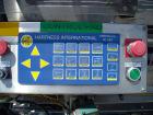 Used Hartness Model 825 Fully Auto Case Packer with all stainless steel frame.Unit has been recently upgraded from factory with Parker drives for auto-laner.Panel is complete with AB 503 PLC controll...