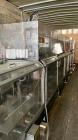 Used-Hartness Model 835 Automatic Descending Drop Case Packer