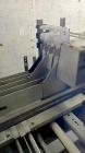 Used-Hartness Model 835 Automatic Descending Drop Case Packer