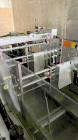 Used-Hartness Model 835 Automatic Descending Drop Case Packer