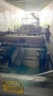 Used Hartness Model 835 Automatic Descending Drop Case Packer