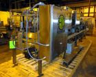 Used Hartness 900 automatic drop case packer capable of speeds up to 25 cases per minute (depending on product and application). Case size range: (Length) 6