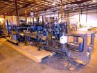 Used Hartness 900 automatic drop case packer capable of speeds up to 25 cases per minute (depending on product and application). Case size range: (Length) 6