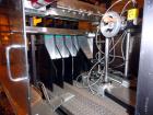 Used- Hartness 900 automatic drop case packer capable of speeds up to 25 cases per minute (depending on product and applicat...