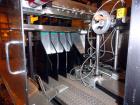 Used Hartness 900 automatic drop case packer capable of speeds up to 25 cases per minute (depending on product and application). Case size range: (Length) 6