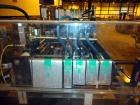 Used Hartness 900 automatic drop case packer capable of speeds up to 25 cases per minute (depending on product and application). Case size range: (Length) 6