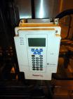 Used Hartness 900 automatic drop case packer capable of speeds up to 25 cases per minute (depending on product and application). Case size range: (Length) 6