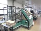 Used Ixapack Case Packer, Model Vendor IX MANU. Speeds up to 60 cases per minute. Last used for aerosol can application, format of aerosols previous packed: 6 x 65mm diameter x 195mm long aerosol can...