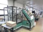 Used- Ixapack Case Packer, Model Vendor IX MANU. Speeds up to 60 cases per minute. Last used for aerosol can application, fo...