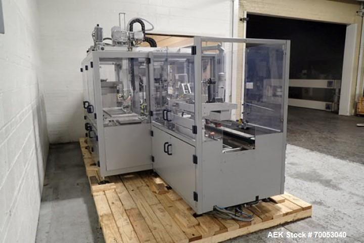 Used Skinetta Top Loading Case Erector Packer, Model CP 150. Servo driven loading head, with powered case feeder and case erector. Integrated top and bottom case taper. Includes controls. 3/60/480 Vo...