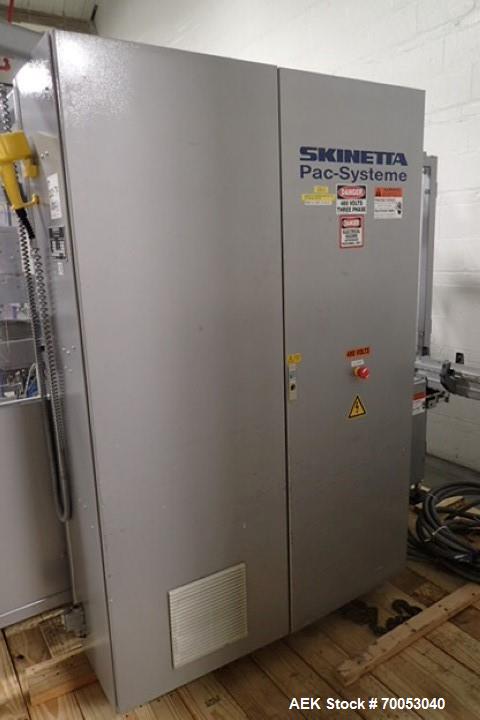 Used- Skinetta Top Loading Case Erector Packer, Model CP 150. Servo driven loading head, with powered case feeder and case e...