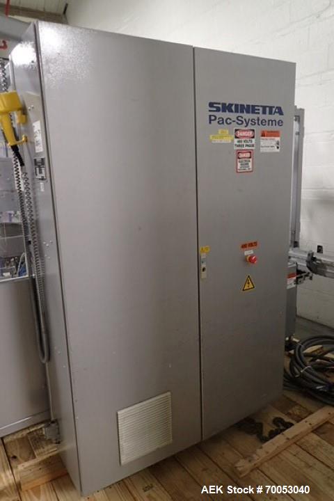 Used Skinetta Top Loading Case Erector Packer, Model CP 150. Servo driven loading head, with powered case feeder and case erector. Integrated top and bottom case taper. Includes controls. 3/60/480 Vo...
