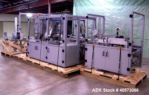 Used Skinetta CP150 Automatic Top Load Robotic Case Erector, Packer And Sealer. Has AB PLC controls, tape seal system and was last running bundles into top load case. Packer Erector / Sealer CP 150. ...