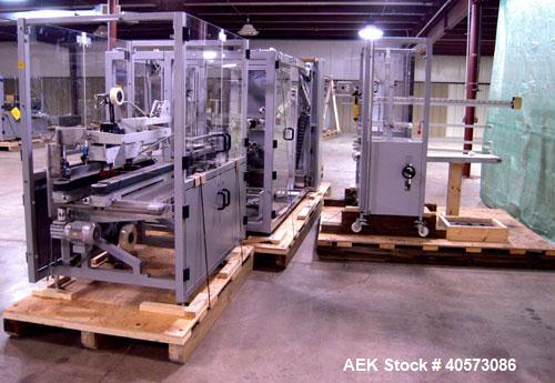 Used Skinetta CP150 Automatic Top Load Robotic Case Erector, Packer And Sealer. Has AB PLC controls, tape seal system and was last running bundles into top load case. Packer Erector / Sealer CP 150. ...