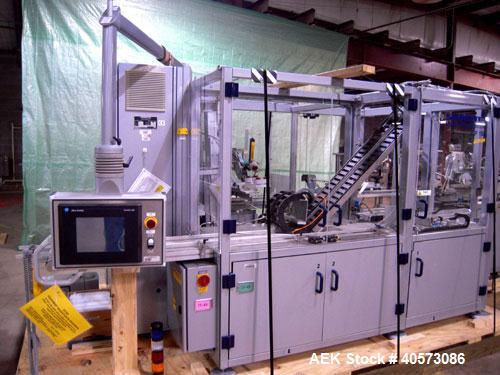 Used Skinetta CP150 Automatic Top Load Robotic Case Erector, Packer And Sealer. Has AB PLC controls, tape seal system and was last running bundles into top load case. Packer Erector / Sealer CP 150. ...