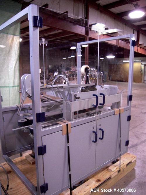 Used Skinetta CP150 Automatic Top Load Robotic Case Erector, Packer And Sealer. Has AB PLC controls, tape seal system and was last running bundles into top load case. Packer Erector / Sealer CP 150. ...