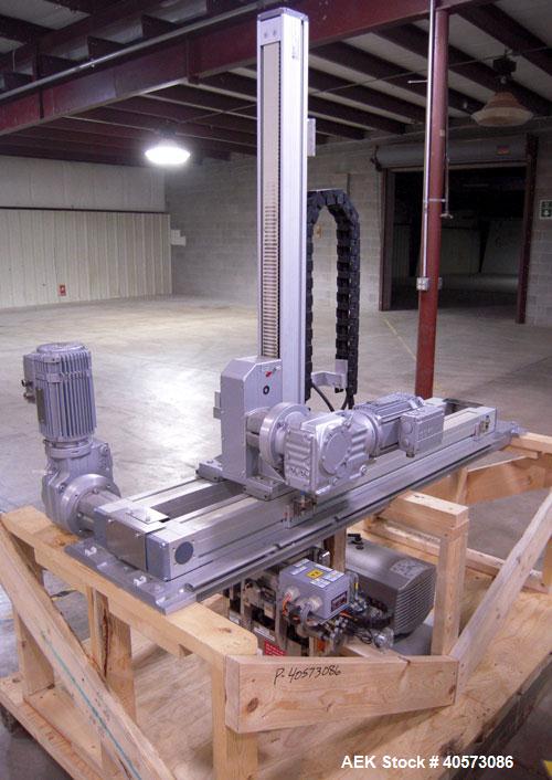 Used Skinetta CP150 Automatic Top Load Robotic Case Erector, Packer And Sealer. Has AB PLC controls, tape seal system and was last running bundles into top load case. Packer Erector / Sealer CP 150. ...