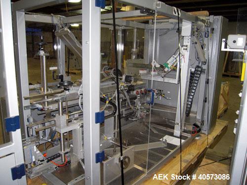Used Skinetta CP150 Automatic Top Load Robotic Case Erector, Packer And Sealer. Has AB PLC controls, tape seal system and was last running bundles into top load case. Packer Erector / Sealer CP 150. ...