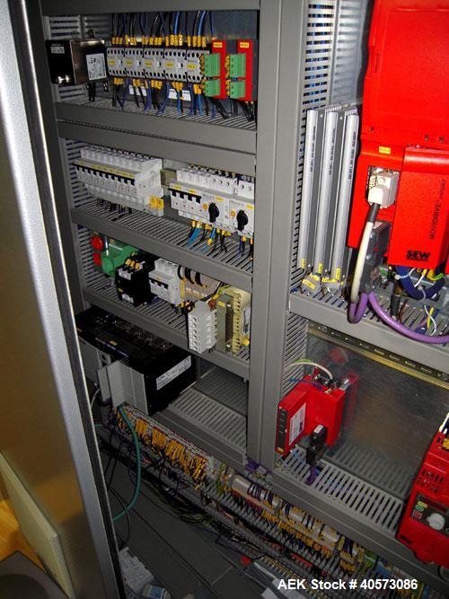 Used Skinetta CP150 Automatic Top Load Robotic Case Erector, Packer And Sealer. Has AB PLC controls, tape seal system and was last running bundles into top load case. Packer Erector / Sealer CP 150. ...