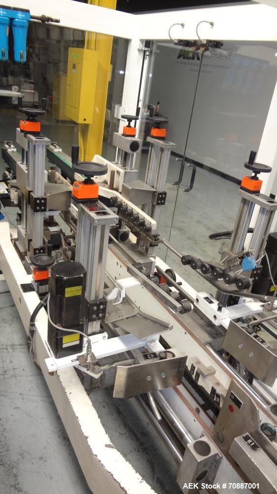 Used Focke Model 486 Automatic Case Erector, Side Load Packer, and Tape Sealer