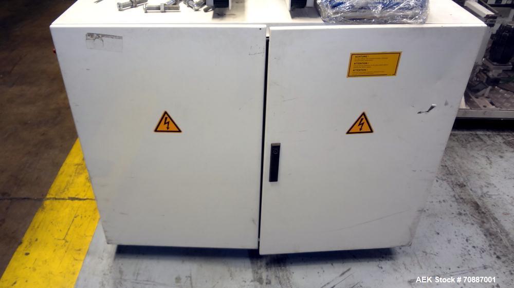 Used Focke Model 486 Automatic Case Erector, Side Load Packer, and Tape Sealer