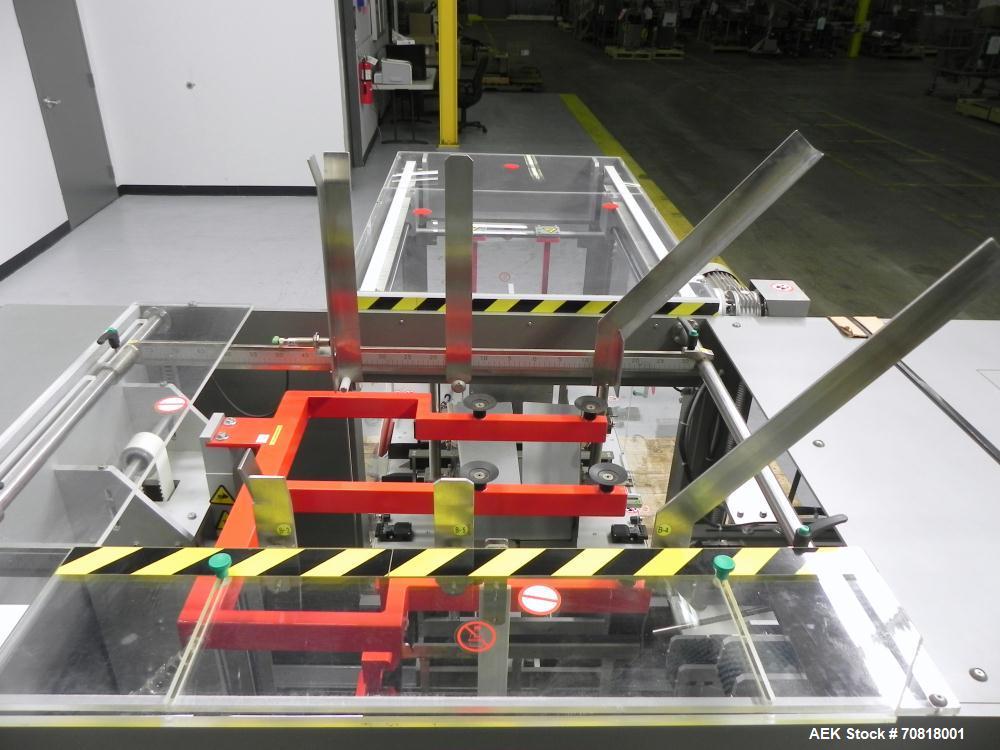 Used Marchesini Type PS 500 Automatic Case Erector / Packer / Sealer. Designed for cartons and equipped with multi-tier stacking collation, and RSC style cases with ps tape sealing. Capable of speeds...