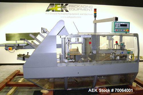 Used Marchesini/Pack Service Automatic Case Erector/Packer/Tape Sealer, Model PS510. Rated up to 13 cases and 300 cartons per minute (depending on case size and pack pattern). Case Size Range: 5.6" -...