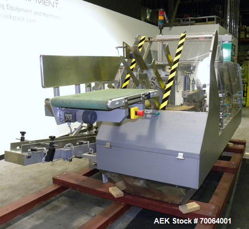 Used Marchesini/Pack Service Automatic Case Erector/Packer/Tape Sealer, Model PS510. Rated up to 13 cases and 300 cartons per minute (depending on case size and pack pattern). Case Size Range: 5.6" -...