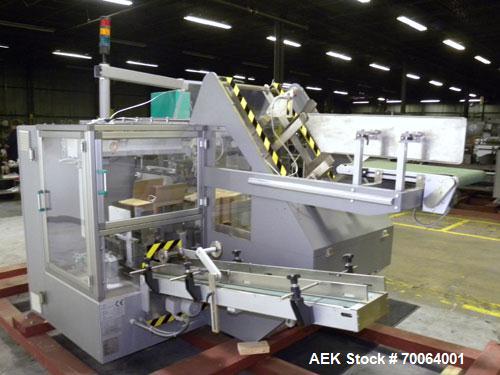 Used Marchesini/Pack Service Automatic Case Erector/Packer/Tape Sealer, Model PS510. Rated up to 13 cases and 300 cartons per minute (depending on case size and pack pattern). Case Size Range: 5.6" -...