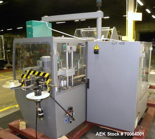 Used Marchesini/Pack Service Automatic Case Erector/Packer/Tape Sealer, Model PS510. Rated up to 13 cases and 300 cartons per minute (depending on case size and pack pattern). Case Size Range: 5.6" -...
