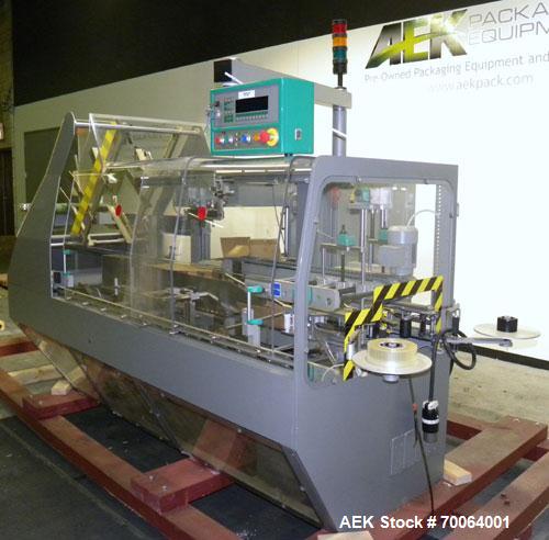 Used Marchesini/Pack Service Automatic Case Erector/Packer/Tape Sealer, Model PS510. Rated up to 13 cases and 300 cartons per minute (depending on case size and pack pattern). Case Size Range: 5.6" -...