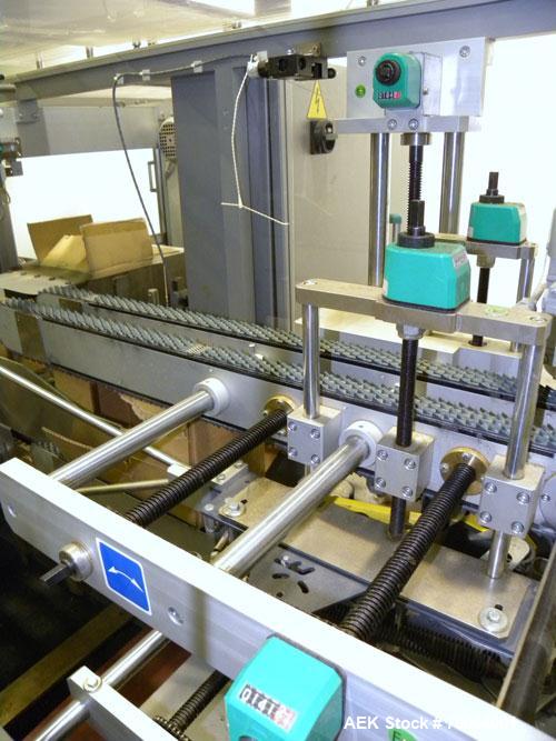 Used Marchesini/Pack Service Automatic Case Erector/Packer/Tape Sealer, Model PS510. Rated up to 13 cases and 300 cartons per minute (depending on case size and pack pattern). Case Size Range: 5.6" -...