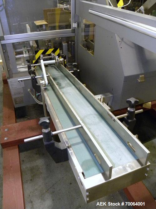 Used Marchesini/Pack Service Automatic Case Erector/Packer/Tape Sealer, Model PS510. Rated up to 13 cases and 300 cartons per minute (depending on case size and pack pattern). Case Size Range: 5.6" -...