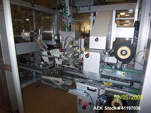 Used Cermex Sidel model SD59 top loading case packer capable of speeds up to 28 case per minute. Has automatic collation, AB PLC controls, tape seal system.