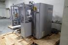 Used- Skinetta Top Loading Case Erector Packer, Model CP 150. Servo driven loading head, with powered case feeder and case e...